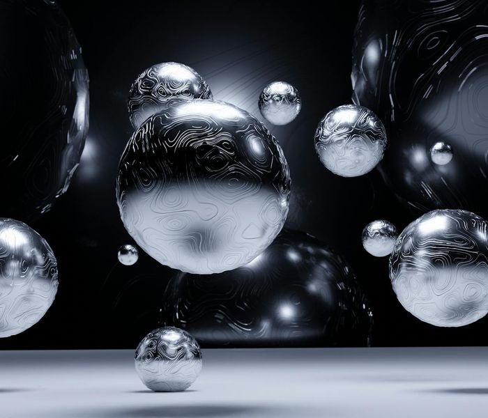 Abstract composition of floating geometric spheres in blue light
